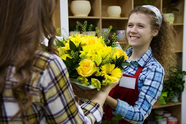 花を売る女性の画像